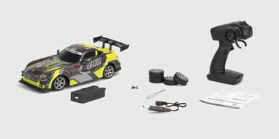 Grøn Super Drifter fjernstyret bil med 4WD og detaljeret karrosseri til drifting på jævne overflader.