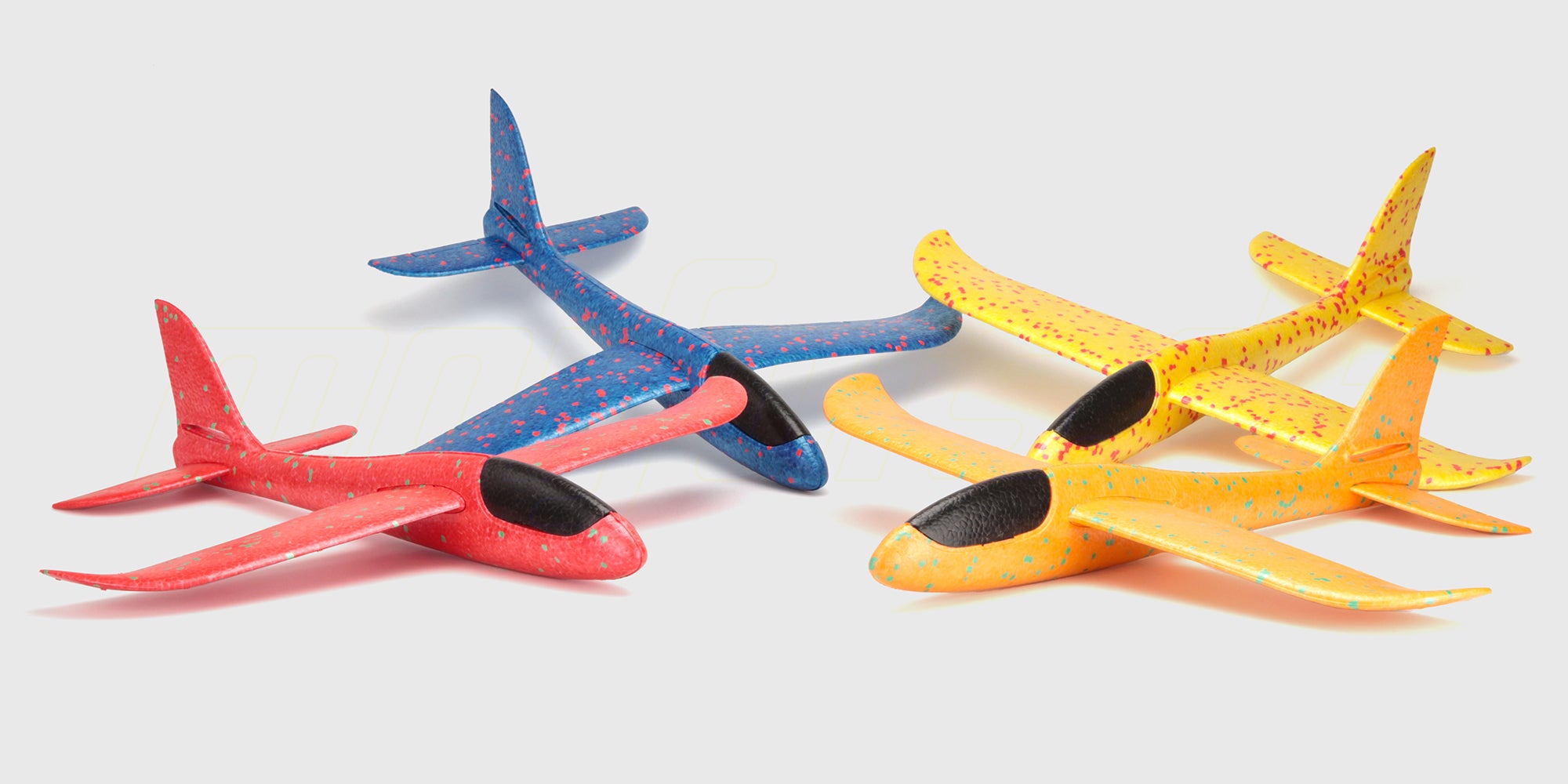 To blå og hvide Super Glider svævefly i skum vist sammen med deres emballage på en hvid baggrund.