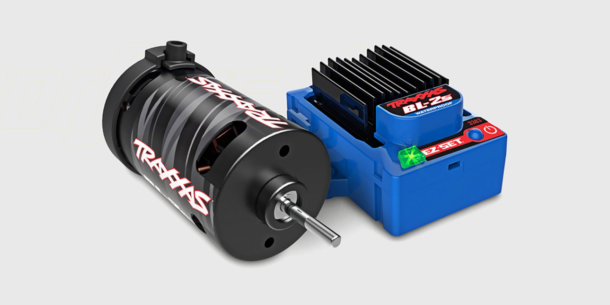 Blåt Traxxas BL-2s børsteløst motorsæt med ESC fartregulator og ledninger til fjernstyret bil.