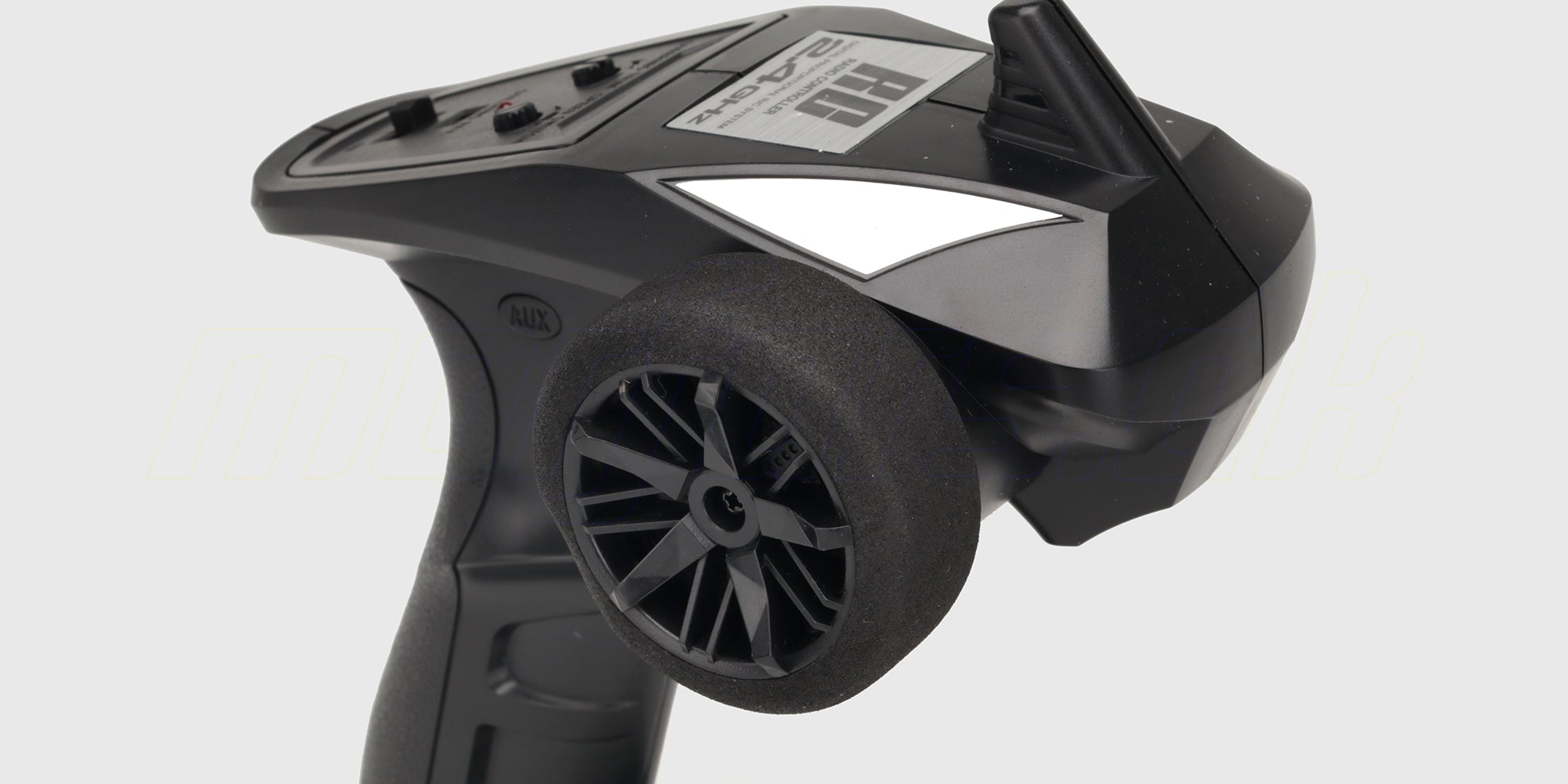 Sort HBX radiosender til fjernstyret bil med 2,4GHz og ergonomisk pistolgreb.