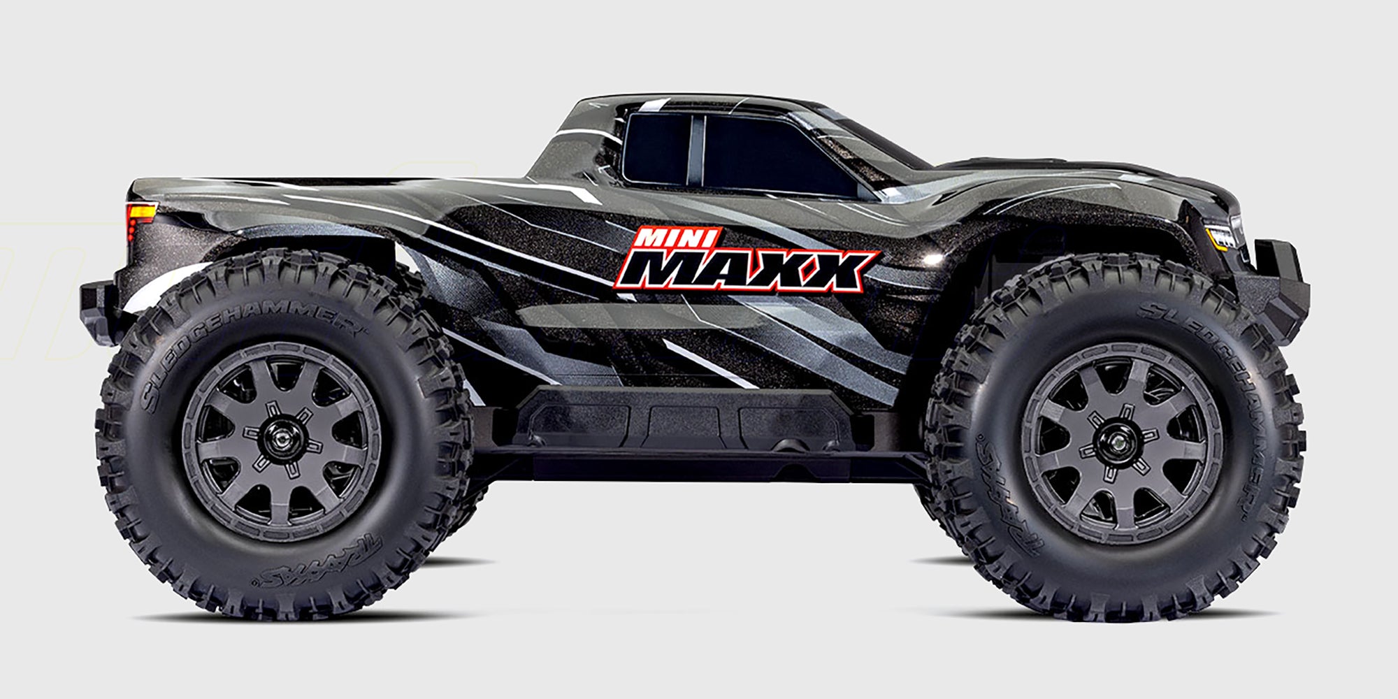 Traxxas Mini Maxx monster truck med 4WD og kraftig affjedring til vild offroad kørsel.