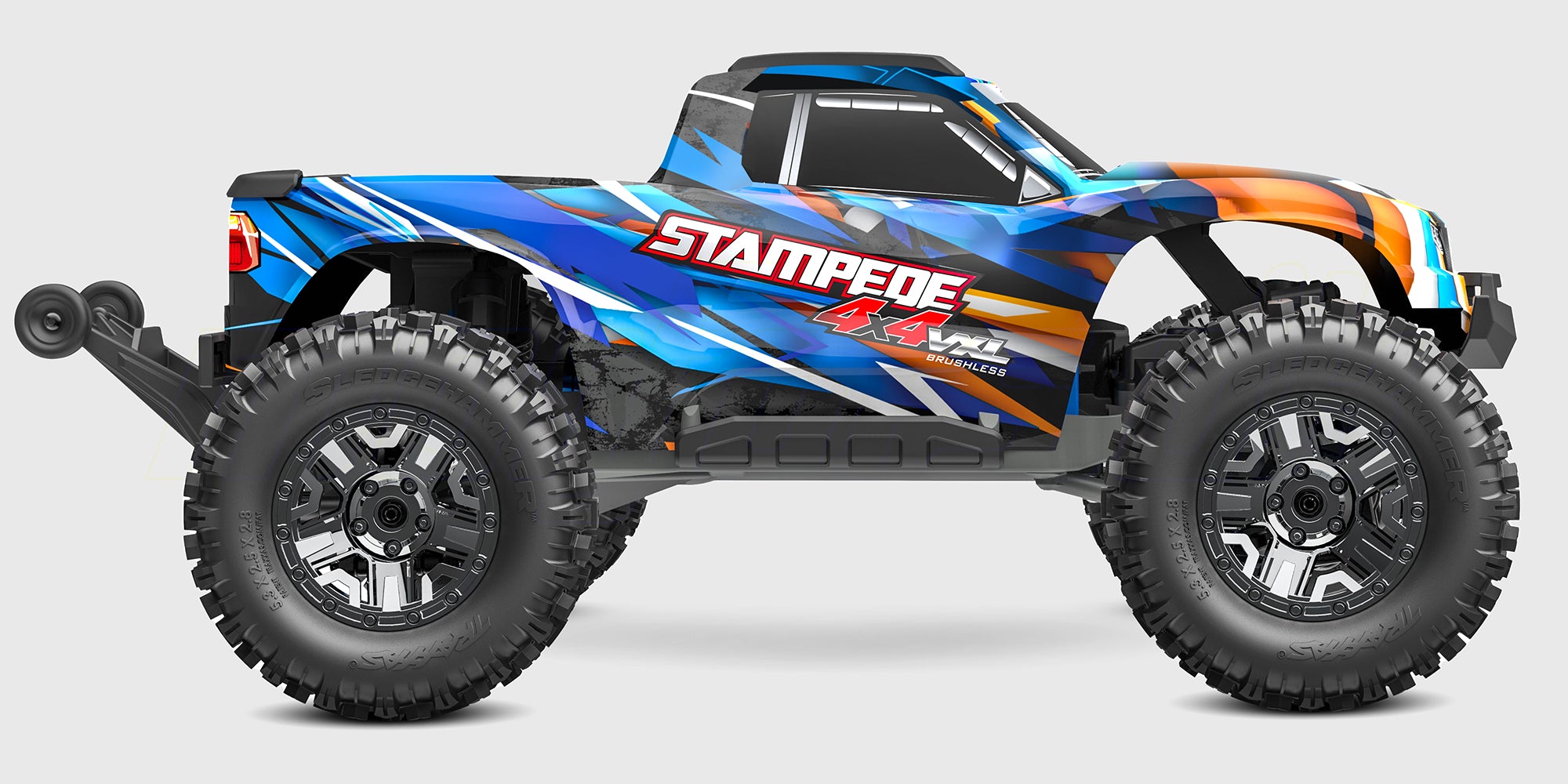 Orange Traxxas Stampede 4x4 VXL fjernstyret monster truck med store dæk og wheelie bar på hvid baggrund.