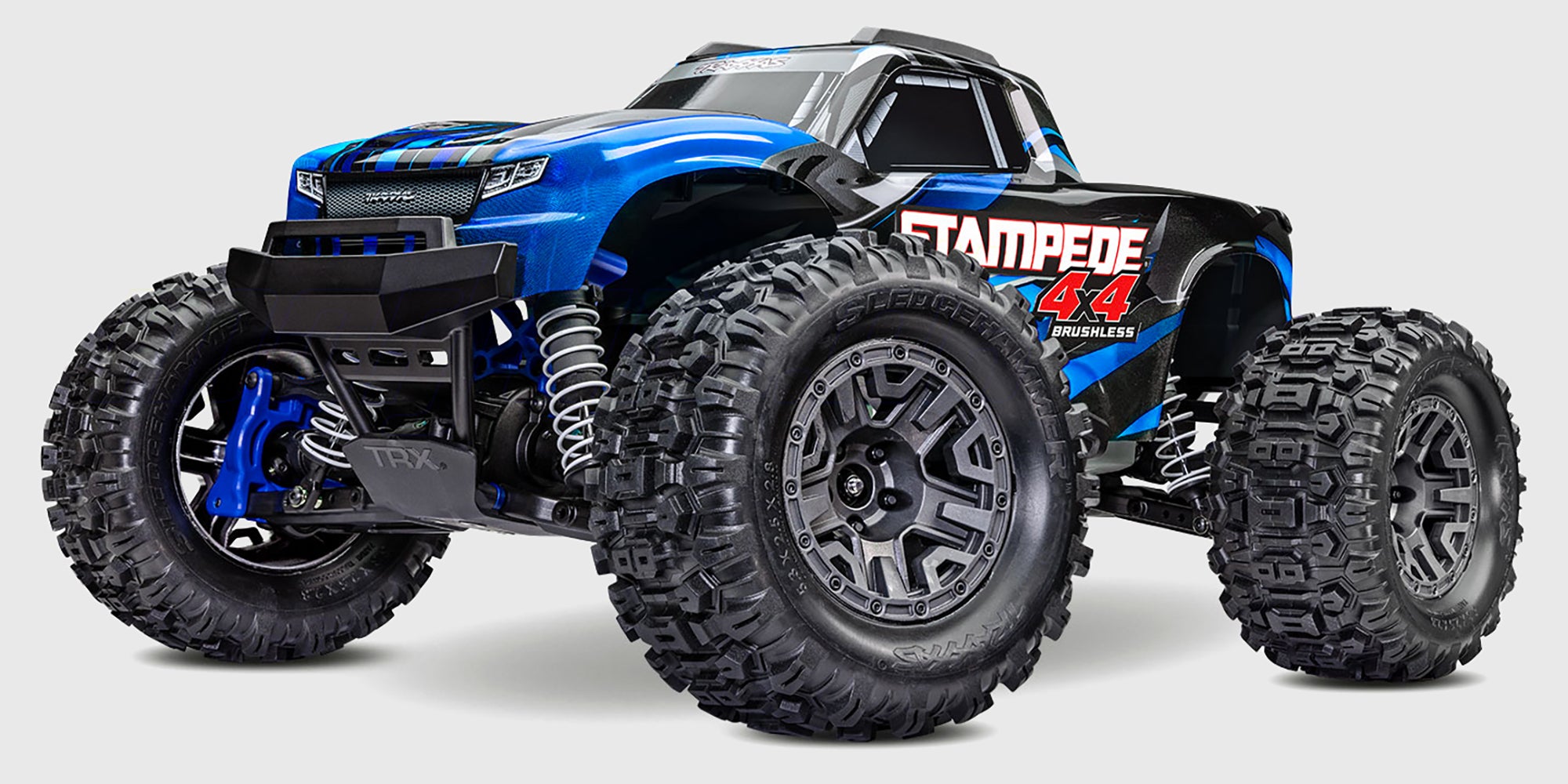 Traxxas Stampede 4x4 BL-2S monster truck med blåt karrosseri og store offroad-dæk set skråt forfra.