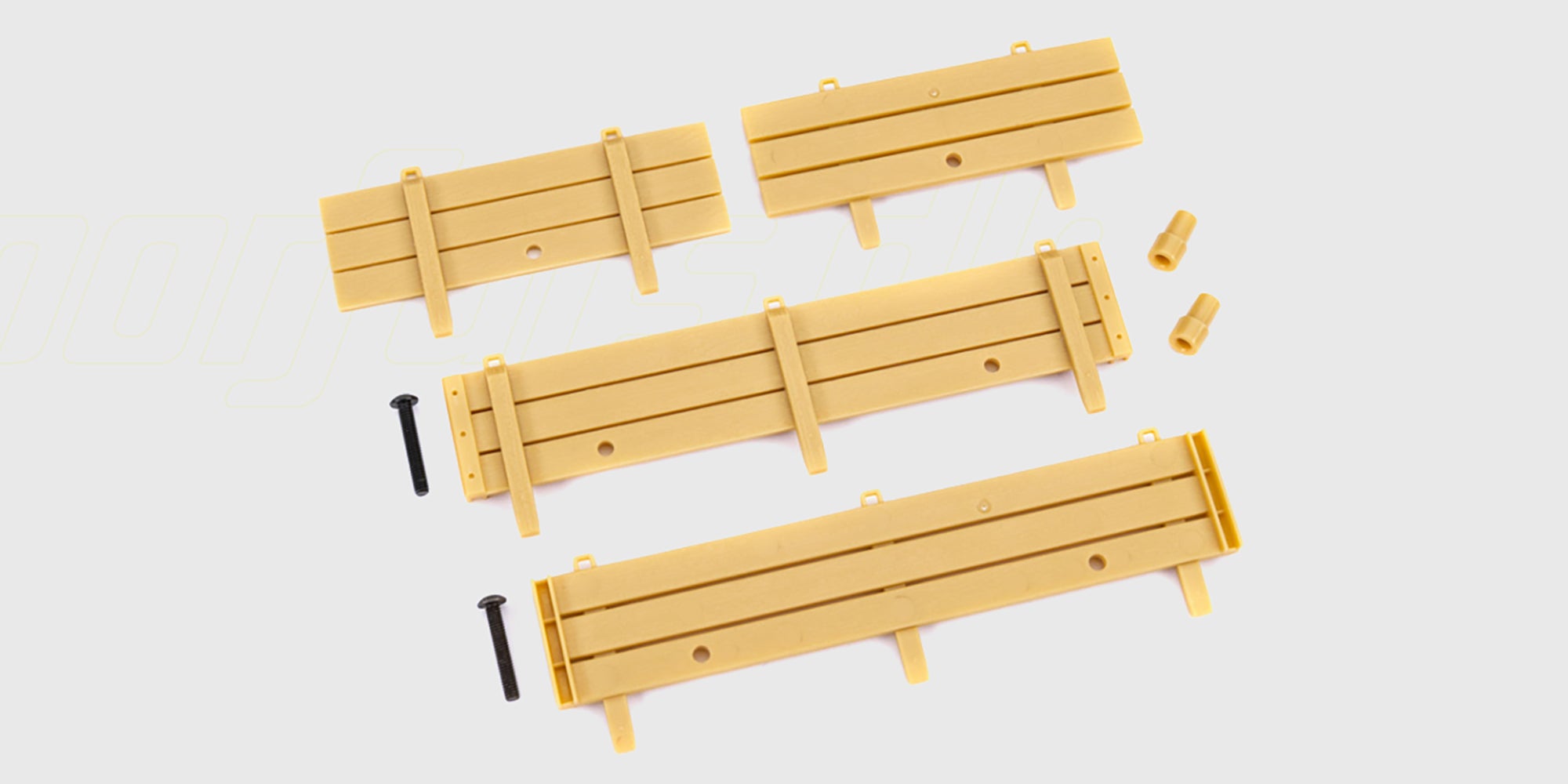 Sort Traxxas TRX-4M Stake Sides Utility Trailer med trædetaljer vist på hvid baggrund.