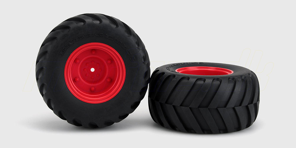 Sorte Wheels Quakeshock hjul med groft dækmønster til offroad kørsel med fjernstyret bil.