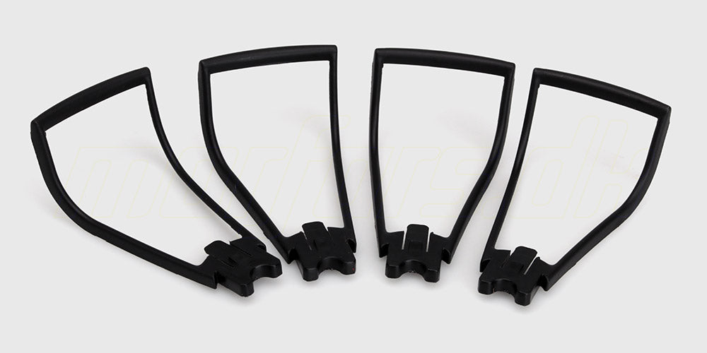 Sæt med fire sorte beskyttelsesringe i plast til propellerne på en Drone STX7.