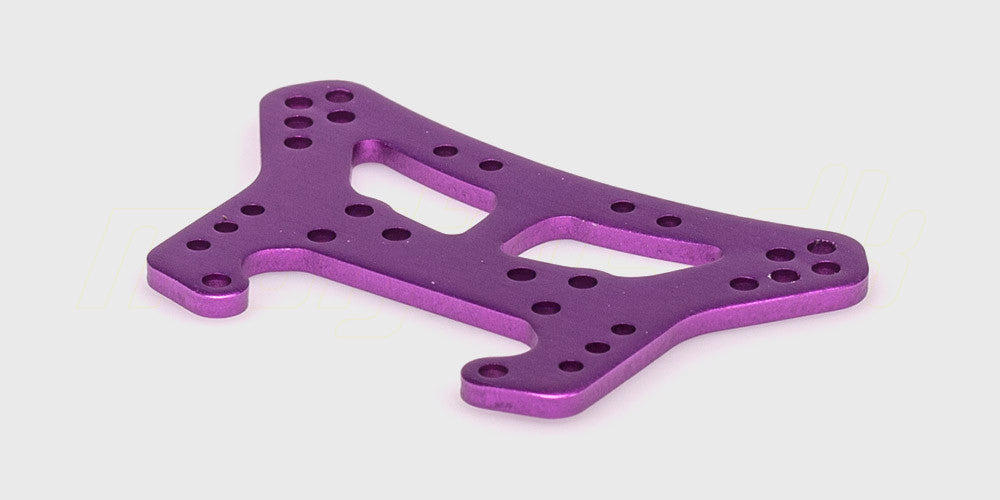 Sort støddæmpertårn i robust plast til montering af affjedring på en fjernstyret bil.