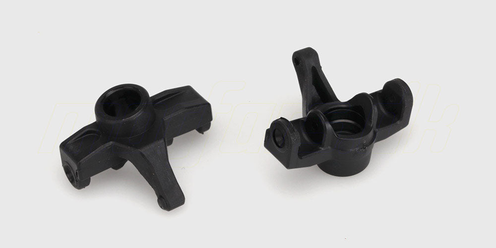Sorte Ravage steering hubs i plast til styretøj på fjernstyret bil vist på hvid baggrund.
