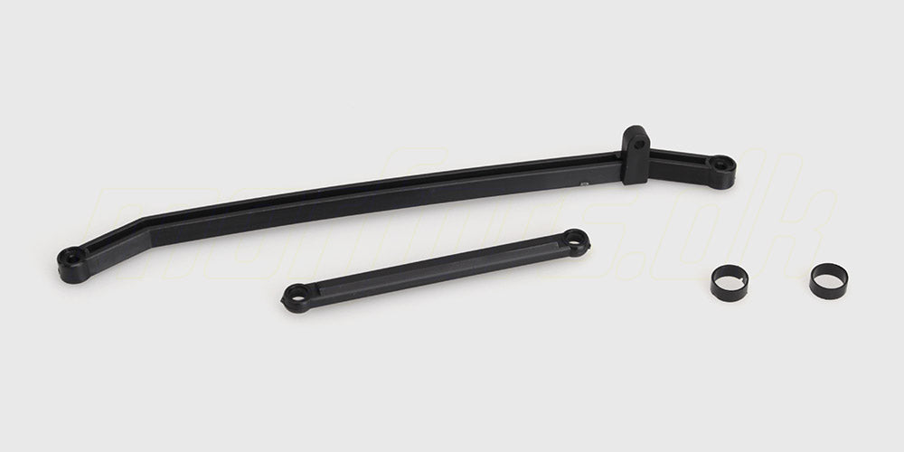 Sæt med styrestænger og servo-pads til fjernstyret bil i hvid plast og metal.