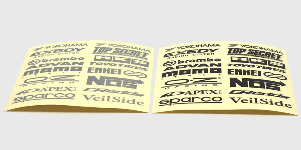 To ark med Bigz logo-klistermærker til fjernstyrede biler i både sølv og sort finish.