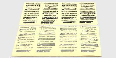 To ark med Racez klistermærker til fjernstyrede biler i både sort og sølv med forskellige sponsorlogoer.